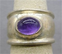 Sterling Silver ring with purple stone, size 5.