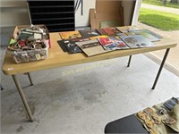 (1) 6 ft Folding Table, (1) Card Table, & A Chair