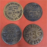 Lot of four vintage brothel/saloon tokens