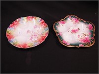 Two oyster plates, both decorated with flowers:
