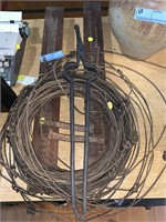 BARB WIRE, IRON TOOL, WOODEN RACK BASE