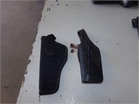 2 left hand holsters