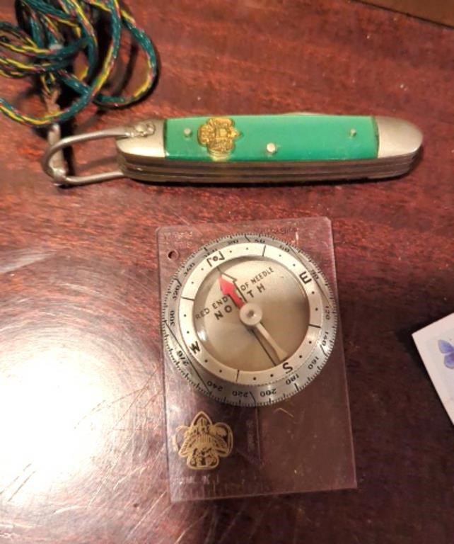 Girl Scout knife and Boy Scout compass