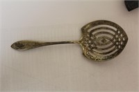 An Antique Reticulated Sterling Spoon