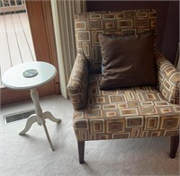 Brown Cushioned Chair and White Wooden Side Table