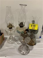 GROUP OF GLASS OIL LAMPS