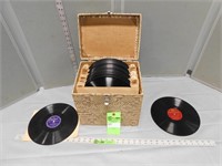Carboard case with many collectible records