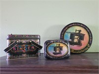 Singer sewing machine tins (3)