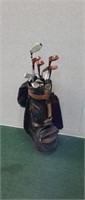 Knight golf bag with assorted vintage golf clubs