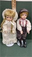 Pair of 16 inch Boy and Girl Dolls with stands,
