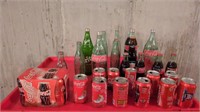 COCA-COLA BOTTLES AND CANS