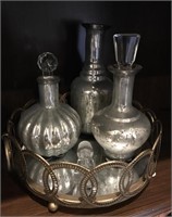 Assortment of Decorative Decanters on Tray