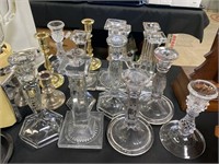 Lot of glass and brass candle holders.