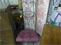Vintage iron chair with face