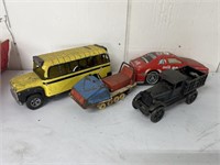 Assorted vintage toys bus snowmobile repo cast