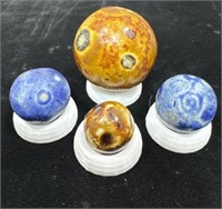 (4) antique Bennington glazed clay marbles