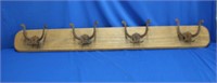 Wall mounted rack with four antique Victorian