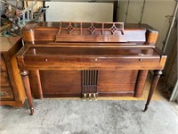 Wurlitzer piano with bench