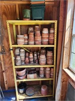 Shelf and Contents.  Terracotta pots. .