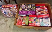 Assorted 500 piece puzzles in boxes