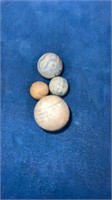 4 clay marbles 1/2” to 7/8”. Near mint