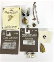 Assorted items including pins, cuff links,