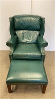 Hancock and Moore Green leather wing chair and