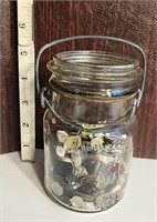 Vintage jar with old buttons