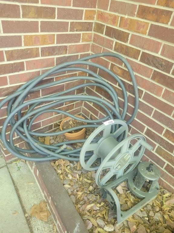 Garden Hose, Hose Reel & Terra Cotta Pot