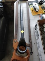 saw and large 1 5/8 wrench