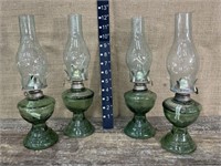 4 green-glass oil lamps - not antique