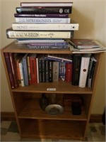 Wooden bookshelf and books