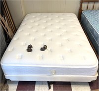 Queen size bed with frame wheels included.