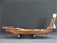 CARVED WOODEN MODEL CANOE ON STAND