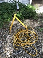 Material Roller And Extension Cord