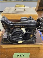 Vintage singer sewing machine with case