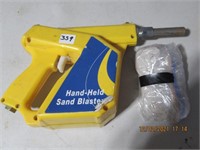Handheld Sand Blaster with small bag of sand