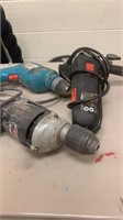 Bucket of drills, angle grinder, shearers
