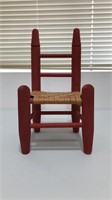 Tiny red chair weaved seat bottom