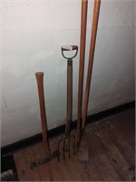 Yard tool lot with axe