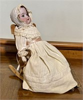 A M 10/0X Doll with rocking chair