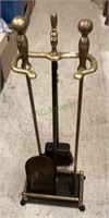 Three piece brass and metal fireplace set with