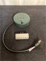 G) handy wind up Rheo extension cord with two