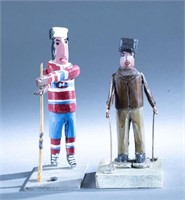 2 Emile Bluteau winter sports figures.