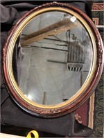 Antique oval mirror with wood frame
