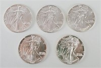 5 1987 One Ounce Fine Silver Eagles.