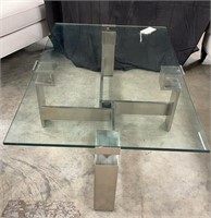 Glass top chrome coffee table