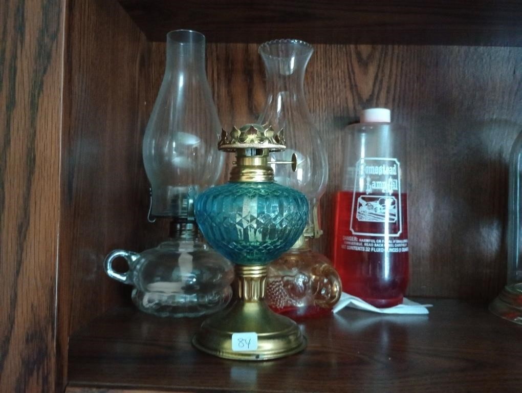 3 vtg.oil lamps and a partial bottle of oil