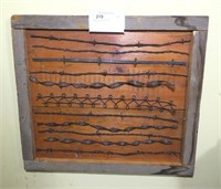 Collection or Barbed Wire in frame,