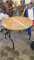 Round table with folding legs